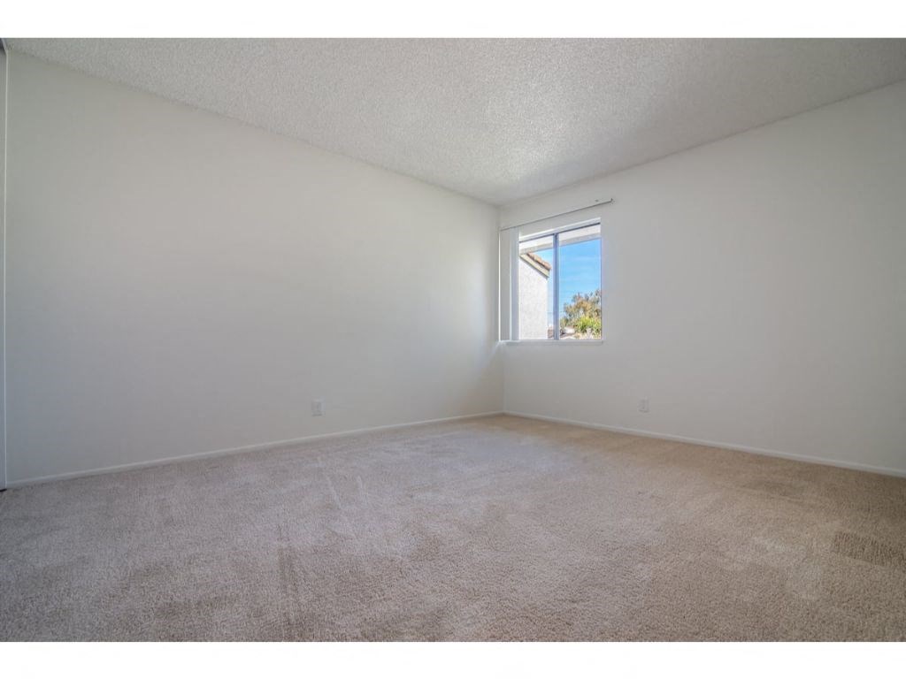 Beige Carpet In Bedroom at Costa Mesa Family Village, California