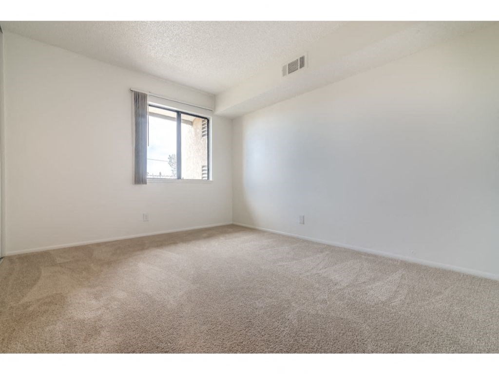 Lush Wall-To-Wall Carpeting In Bedrooms at Costa Mesa Family Village, Costa Mesa