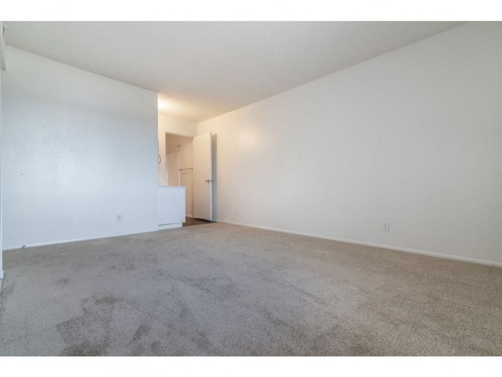 Beige Carpet In Bedroom at Costa Mesa Family Village, Costa Mesa, CA