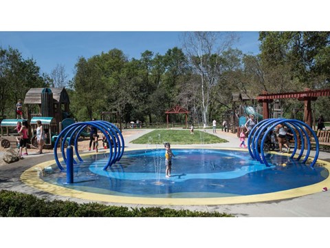 a child plays in a water park