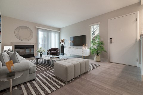 a living room with a fireplace and a tv on the wall  at Laguna Gardens Apts., California