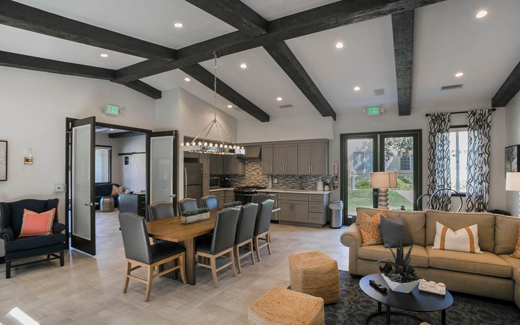 the estates at tanglewood|living room with kitchen and dining area  at Arroyo Villa Apartments, Thousand Oaks, CA