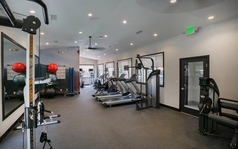 us state at person will look similar to this home gym at Arroyo Villa Apartments, Thousand Oaks, CA, 91320