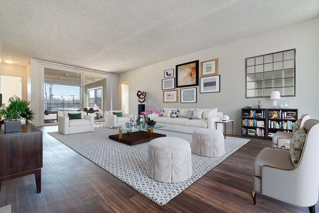 a living room filled with furniture and a rug at Park Avenue Apartments, Long Beach, CA, 90815