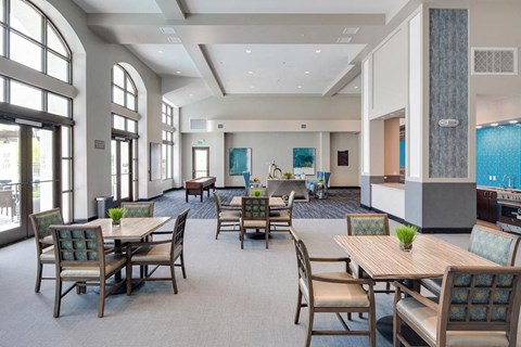 a large room with tables and chairs  at Deer Creek Apartments, San Ramon, 94582