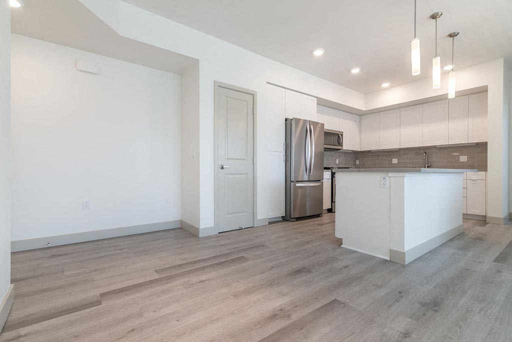 Unfurnished living and kitchen at Montecito Apartments at Carlsbad, Carlsbad, 92010