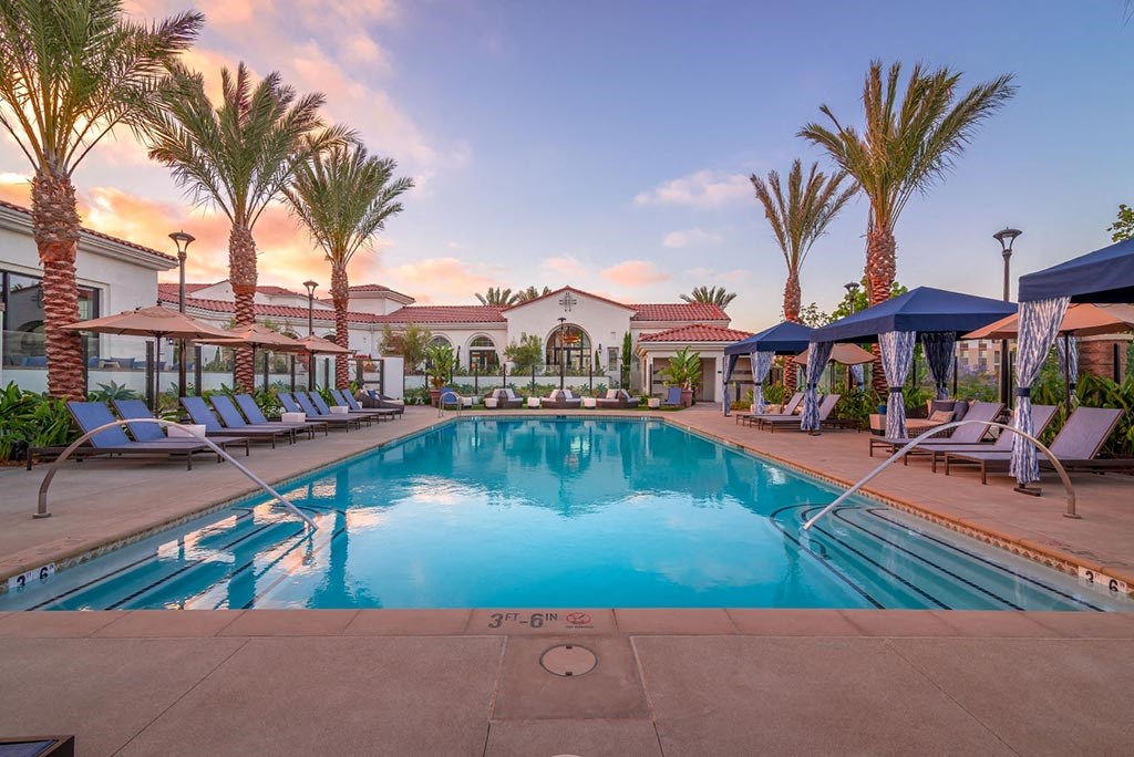 Swimming pool in the evening time at Montecito Apartments at Carlsbad, Carlsbad, California