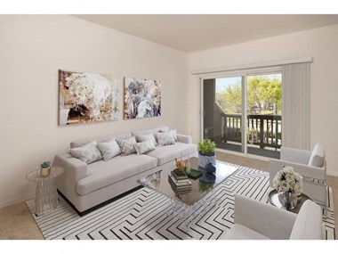a living room with a couch and a table  at Seville at Gale Ranch, San Ramon