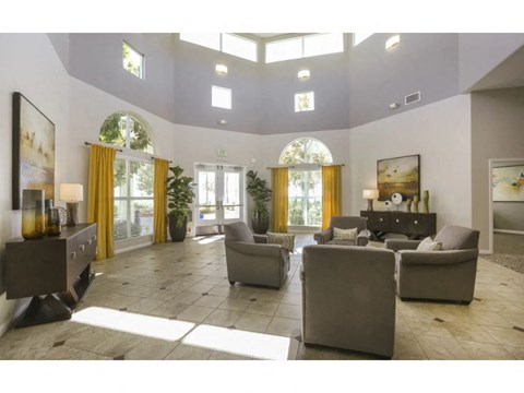 Lobby entrance with couches and chairs  at Tesoro Senior Apartments, Porter Ranch, CA, 91326
