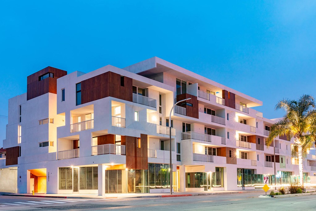 a rendering of a new apartment building on the corner of a street a rendering of a new apartment building on the corner of a street at The Lucky Apartments, Culver City, CA, 90066