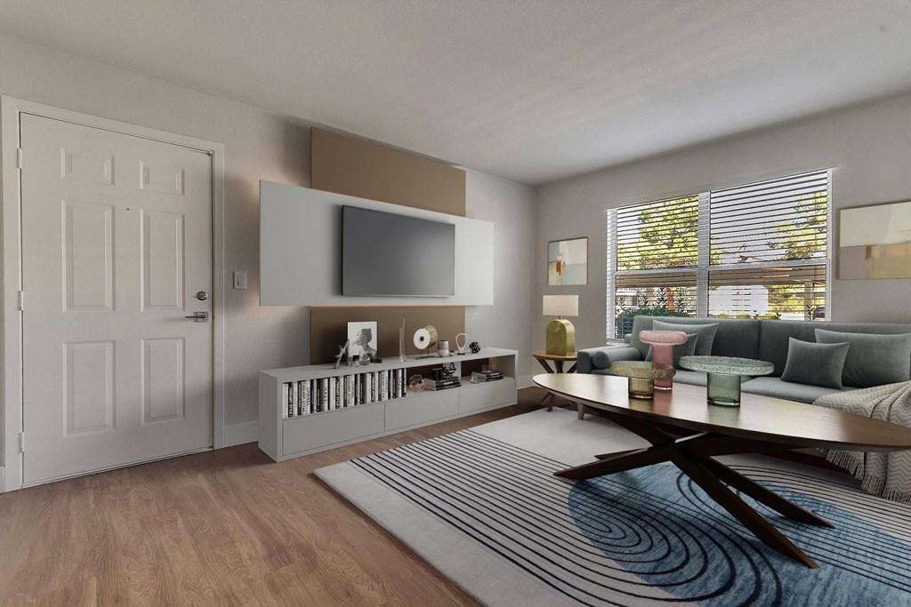 A modern living room with a wooden floor and a large window at Bella Terra Apartments, Nevada, 89012