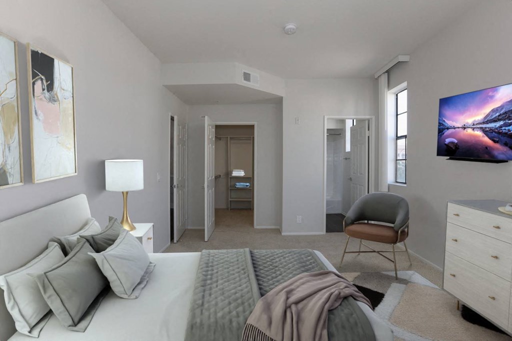 a bedroom with a bed and a chair and a closet at Burton, Los Angeles, CA, 90048