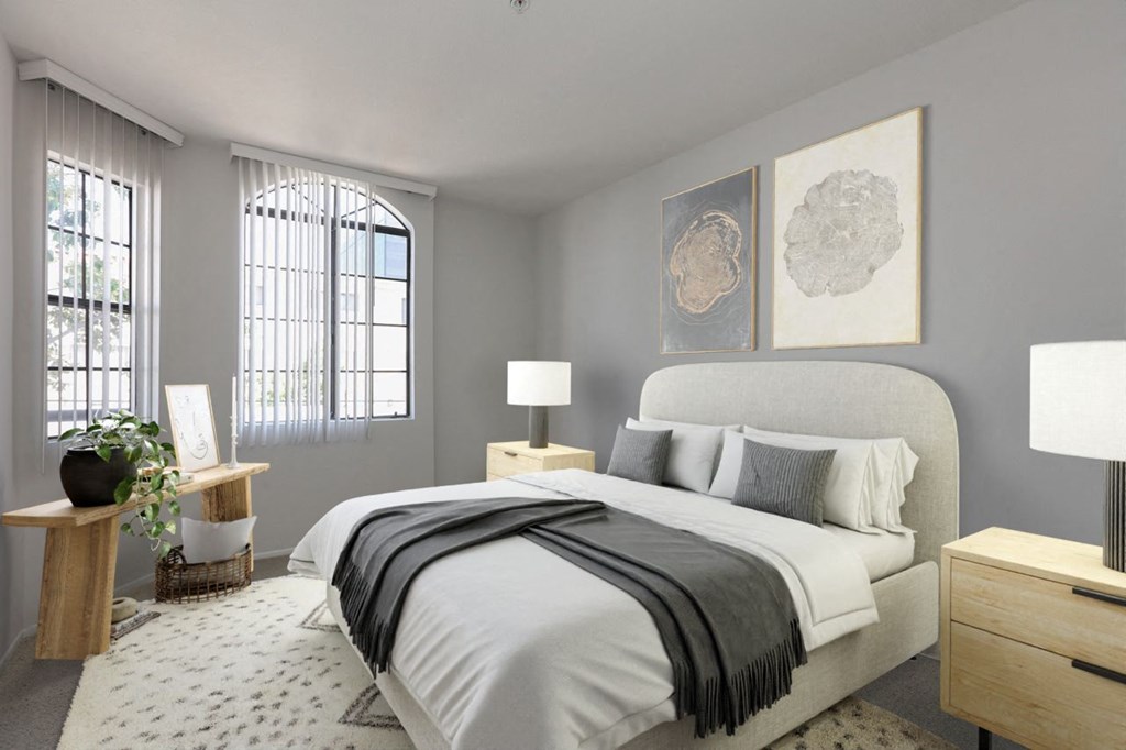 a bedroom with grey walls and a white bed at Burton, Los Angeles, CA