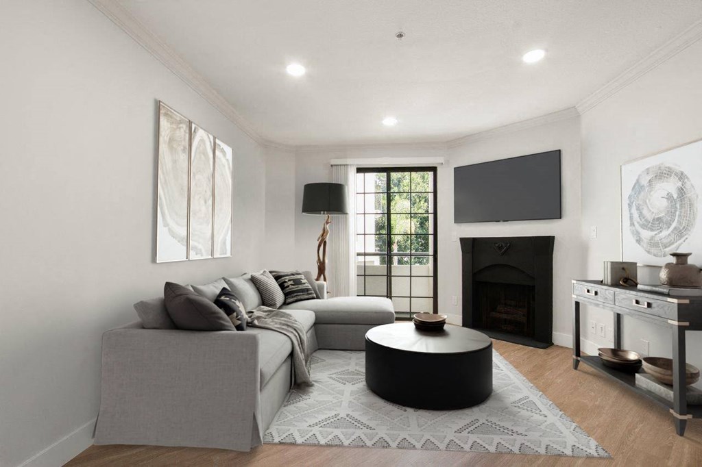 a living room with a couch and a table at Burton, Los Angeles, CA