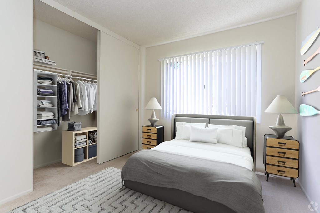 a bedroom with a bed and a closet