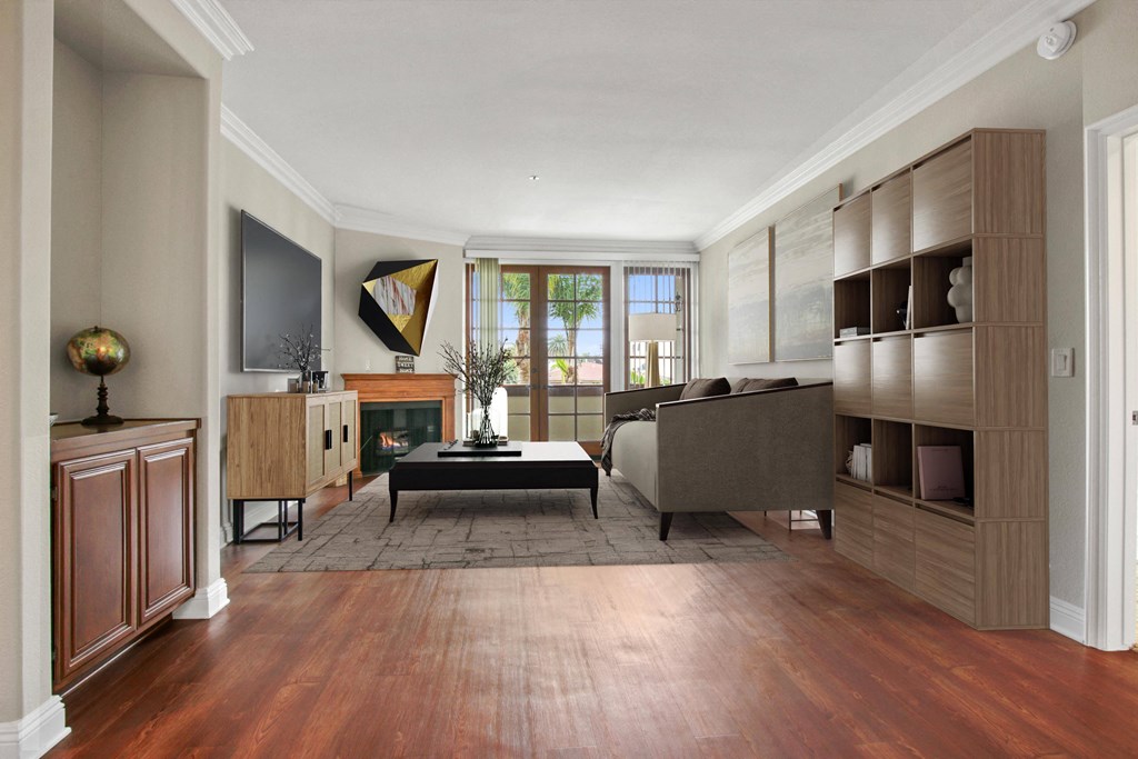 a living room with a couch and a coffee table at Darlington Apartments, Los Angeles