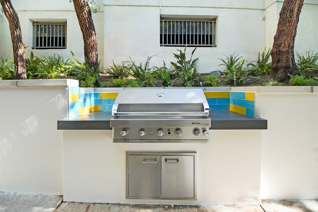 a stainless steel barbecue grill in a backyard at 433 Midvale - Student Housing at UCLA, Los Angeles, 90024