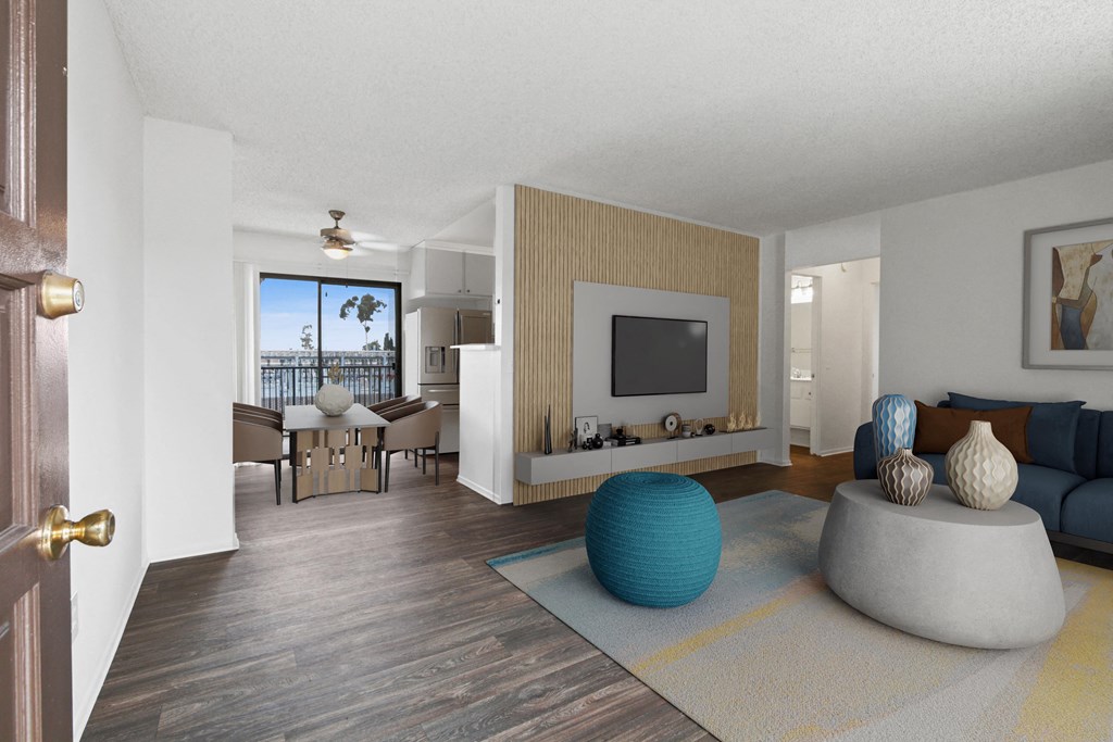 a living room with a couch and a table and a television