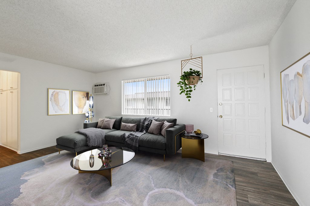 a living room with a couch and a coffee table