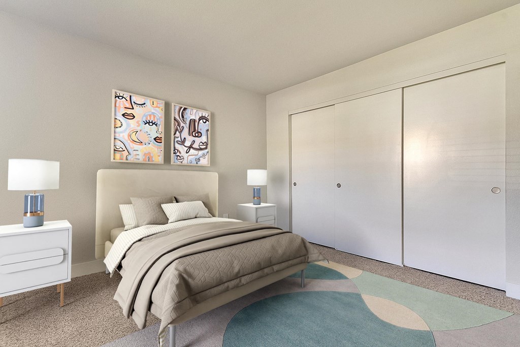 a bedroom with a bed and a closet at Bella Terra Apartments, Nevada, 89012