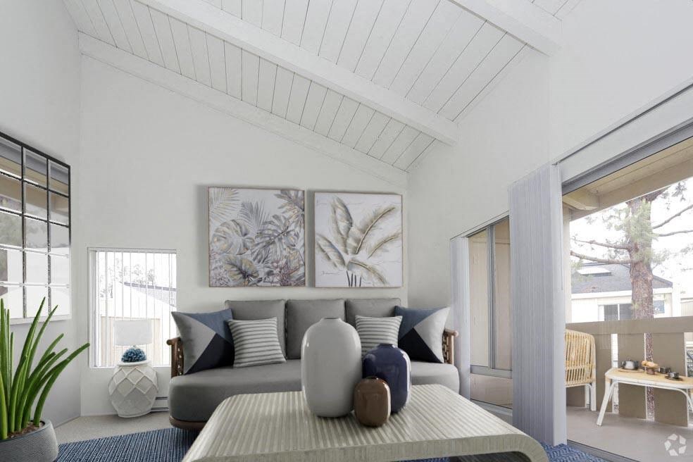 a living room with a couch and a table