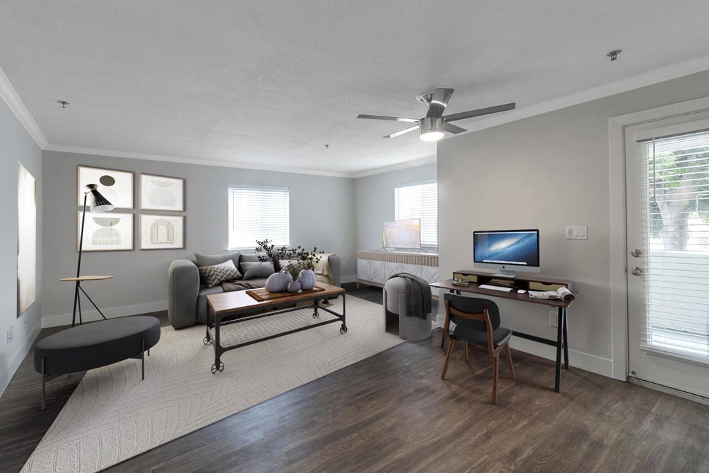 a living room with a ceiling fan and a tv at Nobel Court, California, 92122