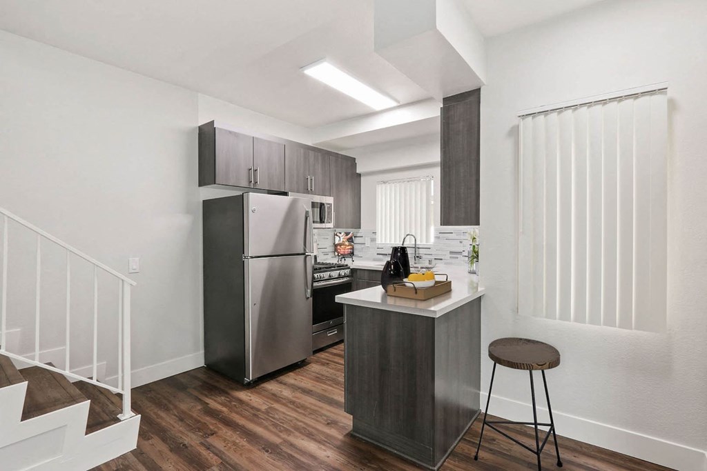 Kitchen area with appliances at Alon Apartments, Los Angeles, California
