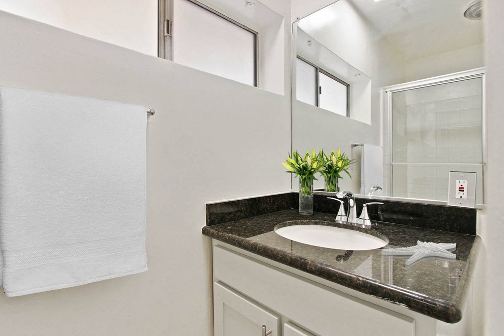 a bathroom with a sink and a mirror at The Mark Culver City, California, 90230