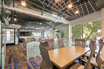 Clubhouse dining table at Midvale Apartments, Los Angeles, CA, 90024