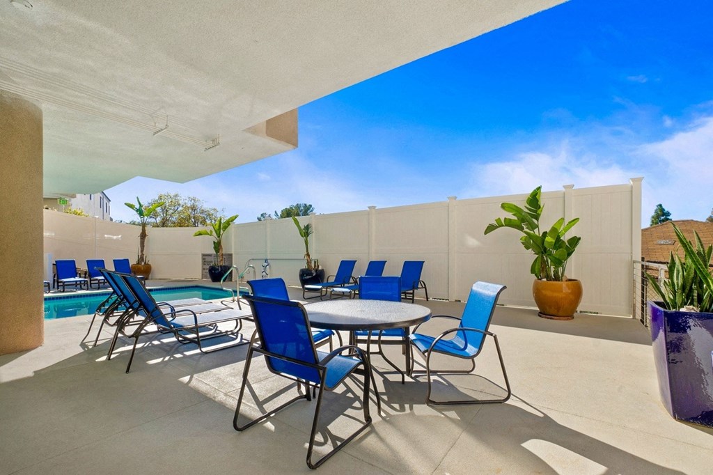 Pool side sitting area at Midvale Apartments, California