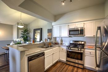 Kitchen with cabinets at Milan Apartment Townhomes, Las Vegas, Nevada