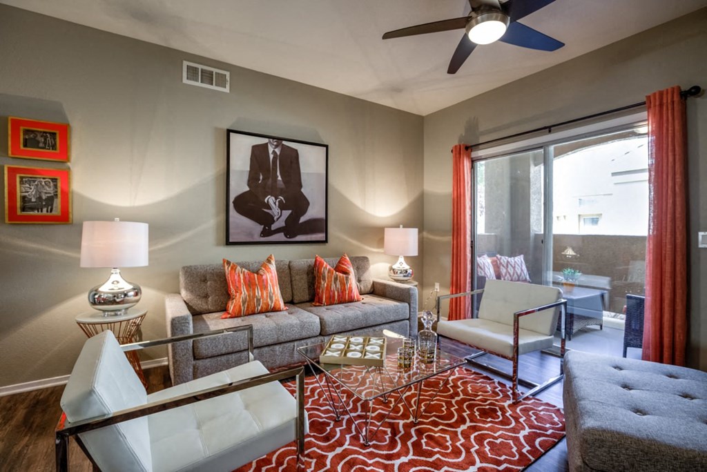 wooden table and sofa at Milan Apartment Townhomes, Las Vegas, NV