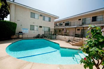 Pool BBQ view at Palm Capri Apartments, California