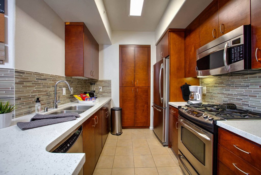 Spacious Kitchen With Pantry Cabinet at The Adler Apartments, Los Angeles, CA, 90025