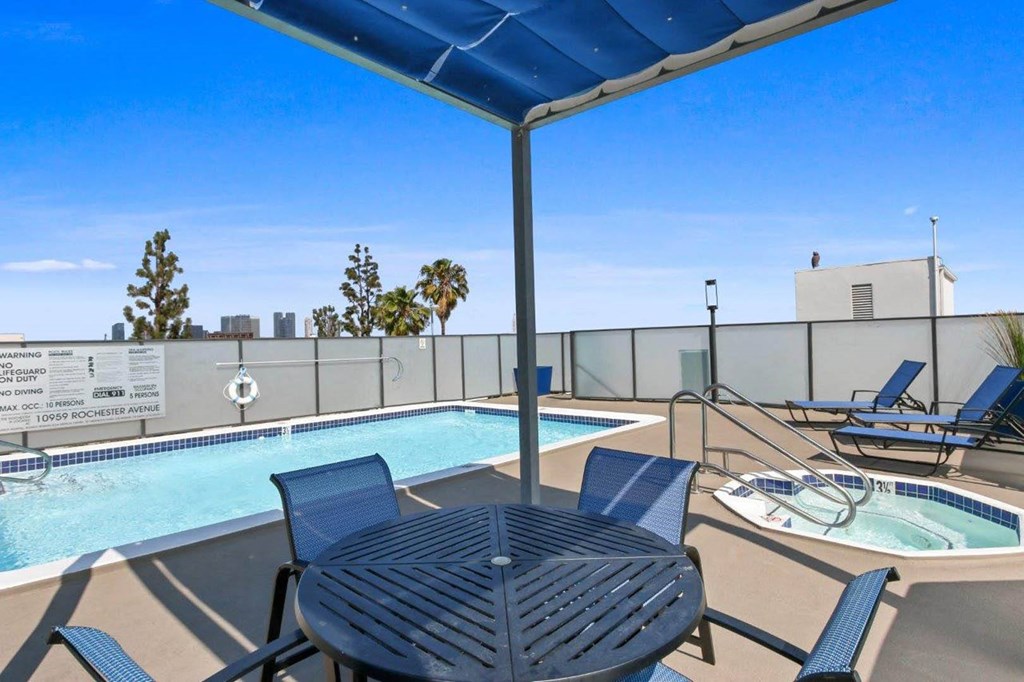 Poolside Dining Table at Rochester Apartments, Los Angeles, CA, 90024