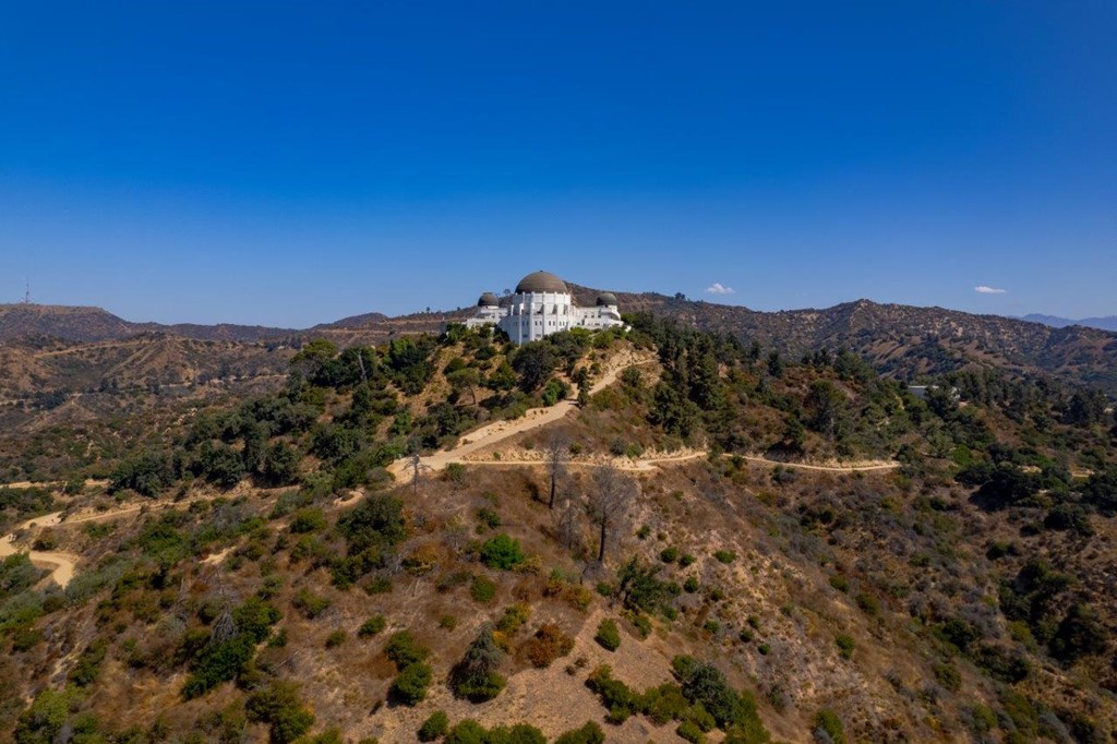 a view of the griffith observatory from the top of a hill at The Kenmore Los Feliz, Los Angeles