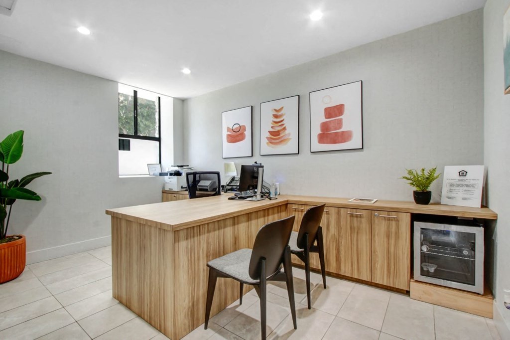 a room with a desk and two chairs at The Kenmore Los Feliz, California