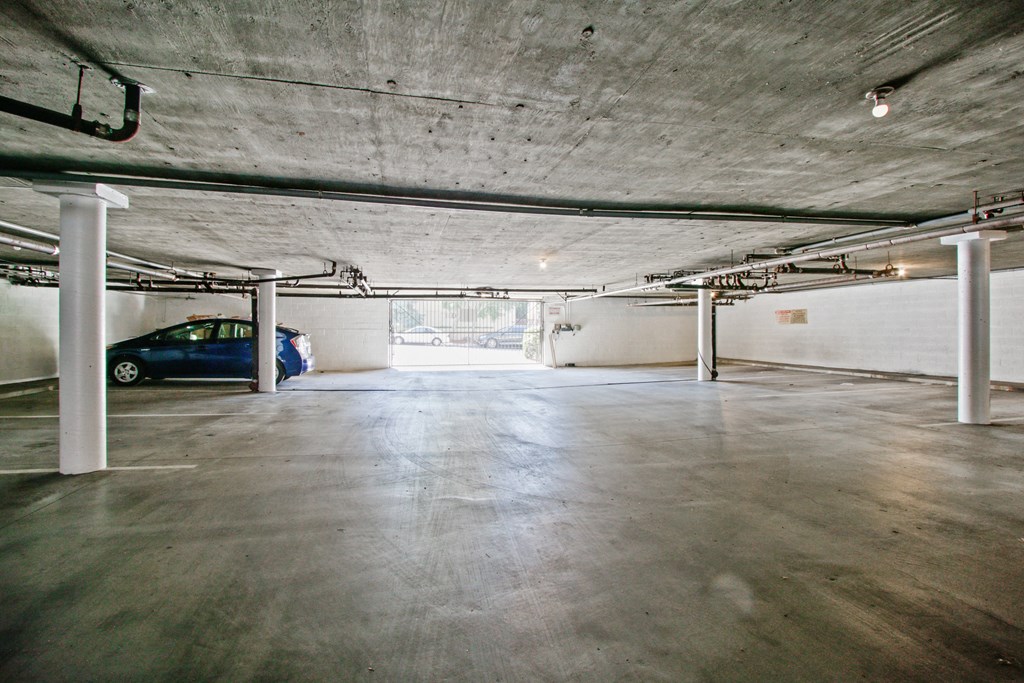 a large parking garage with a car in it