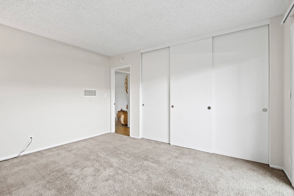 Carpeted Bedroom at Clair Del and Clair Del Gardens, Long Beach, California