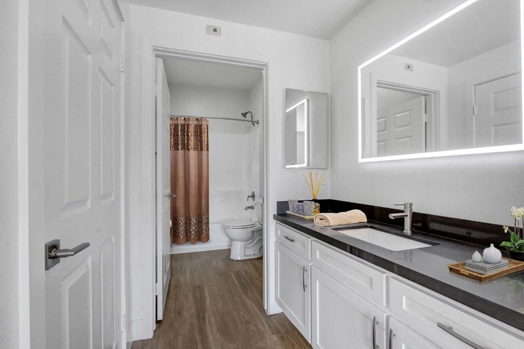 a bathroom with a sink and a toilet at Toluca Court, Toluca Lake, CA