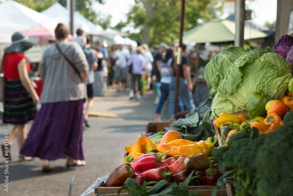 people shopping at a farmers market with vegetables at Darlington Apartments, Los Angeles, CA