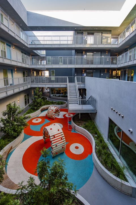 A playground area with a slide and a ball pit.