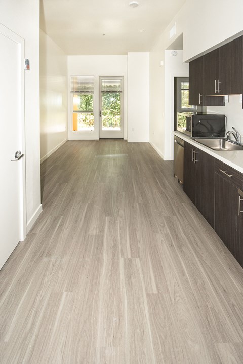 Sample Unit: Interior of Unit with windows and kitchen