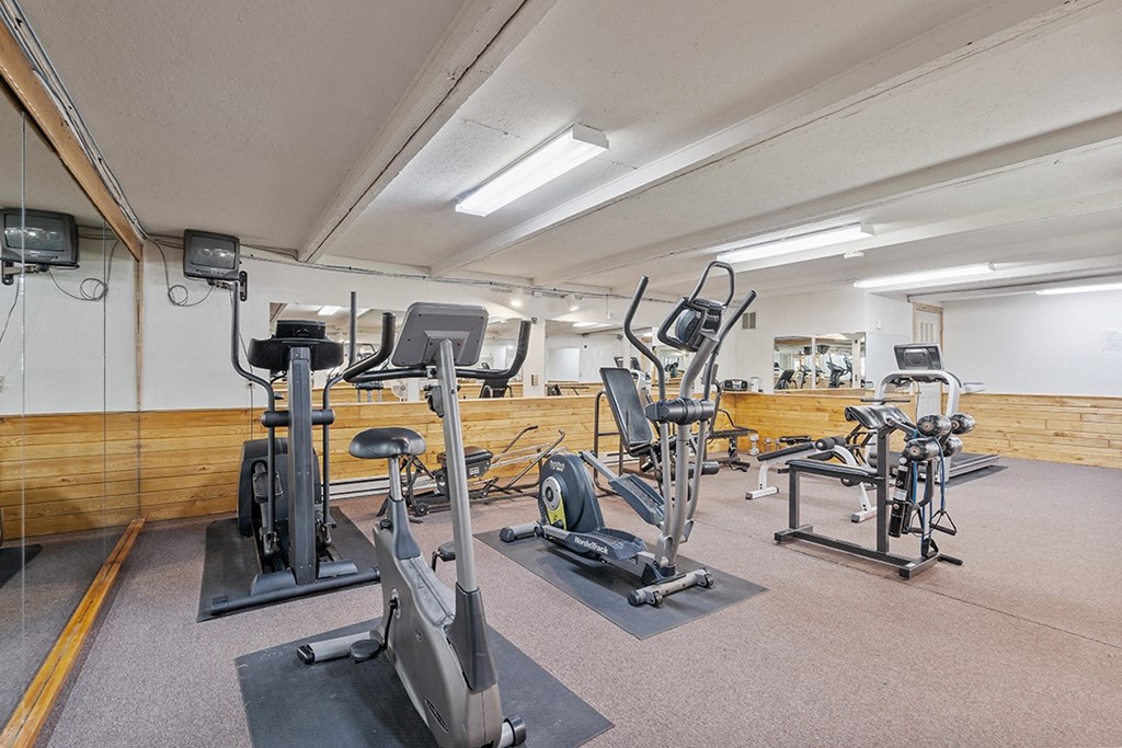 a gym with weights and other exercise equipment