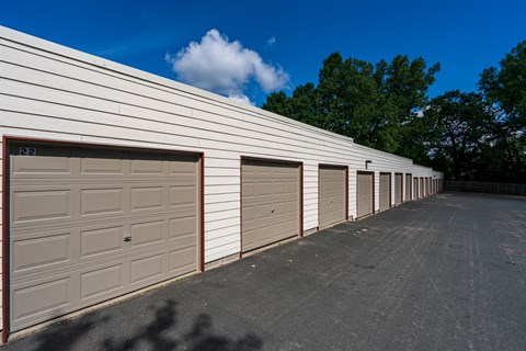 a row of garage doors on the side of a building