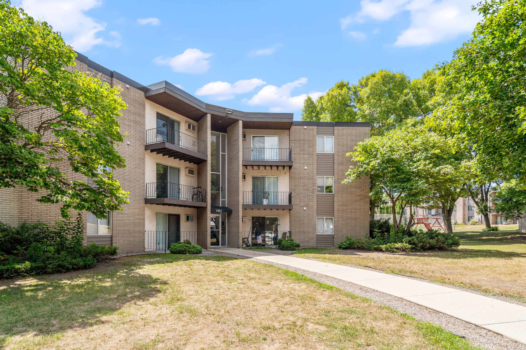 our apartments at the district feature a spacious courtyard and green grass