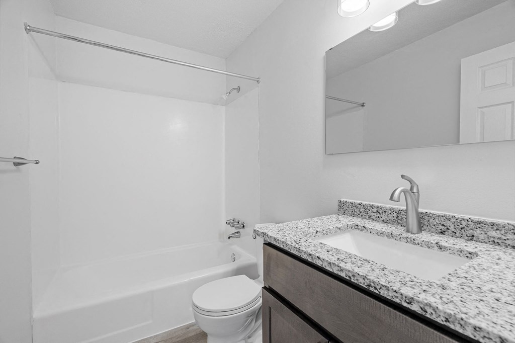 the preserve at ballantyne commons bathroom with sink toilet and shower