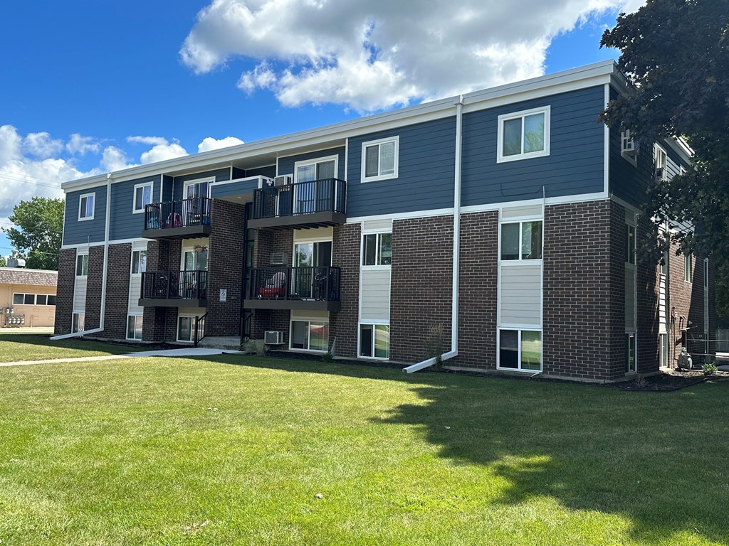 our apartments are located in a quiet area with green grass