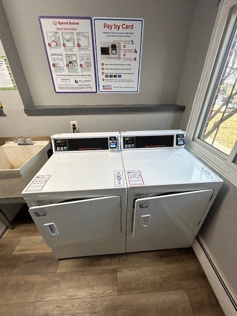 a laundry room with two washing machines