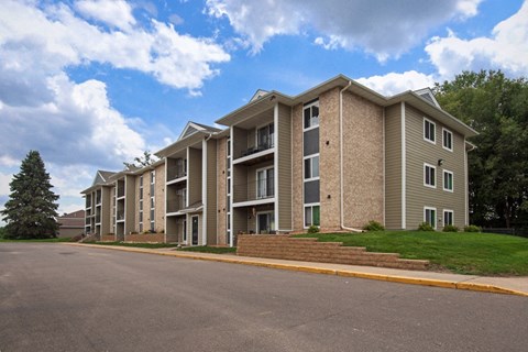 our apartments are located on the corner of a street